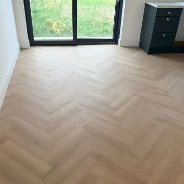 light herringbone flooring dubai apartment